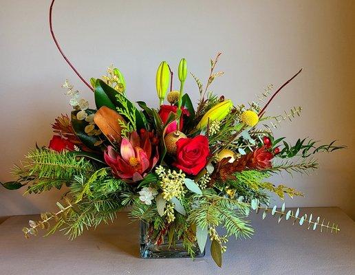 This beautiful Holiday floral arrangement was artfully and lovingly crafted by Angel !!