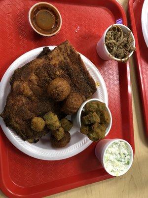 Half rack of ribs with slaw and okra. Pulled pork on the side.