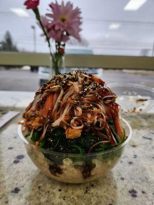 Spicy salmon with crab, seaweed just to name a fee