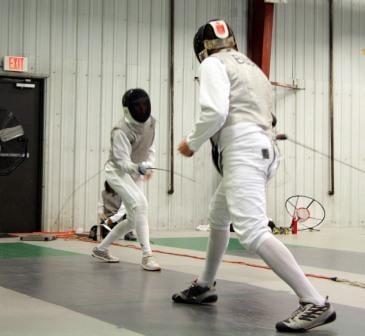 Fencers on the strip at Rockville Fencing Academy