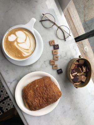 Hot latte and chocolate croissant