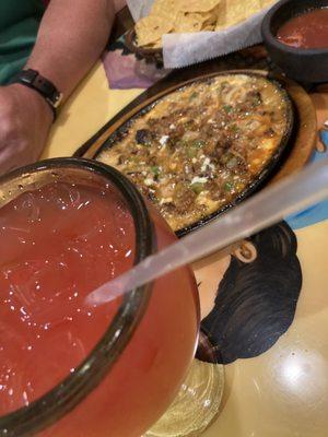 Strawberry Margarita and chorizo queso