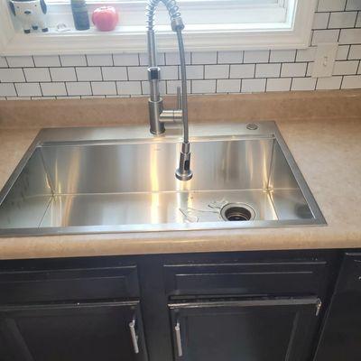 Installed new sink, faucet, a d garbage disposal.