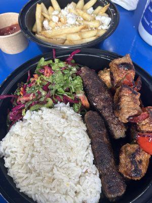 Bifteki platter with rice & extra side of chicken & lamb souvlaki