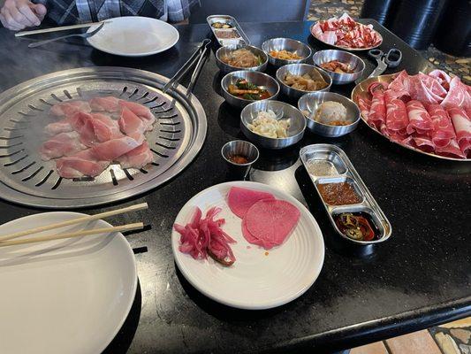 BBQ table with ban chan (side dishes)