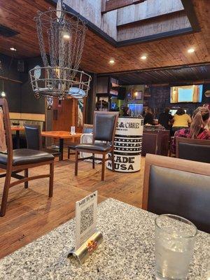 Natural light with wood siding and metal accents in the bar area...interesting scene