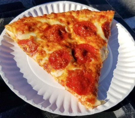 Slice of their hot and ready Pepperoni Pizza.  Better than many slices of similar providence.