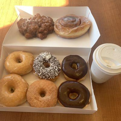 Assortment donuts with Apple fritter and cinnamon roll.