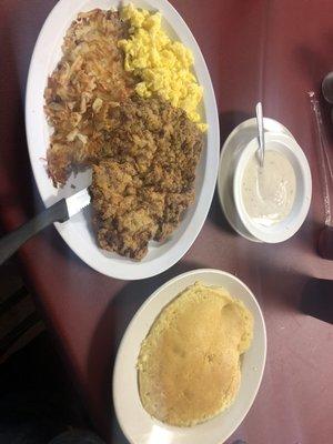 Chicken fried steak w/gravy, hash browns, scrambled eggs, & pancake $9.99