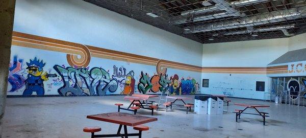 Cafeteria. Not sure who did the graffiti but it's nice!