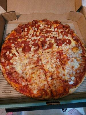 Onion, half pepperoni.