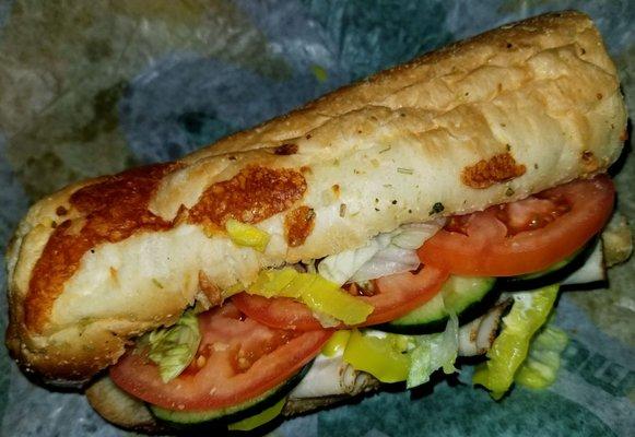 6inch Italian cheese& herb with Turkey, American Cheese, Toasted, Cucumbers, Tomatoes, extra banana peppers, lettuce, ranch, salt &pepper!