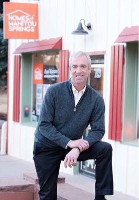 Mike outside of his business, Homes of Manitou Springs.