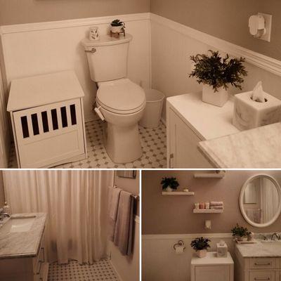 Afters of guest bathroom remodel. New tile floor, new paint, new epoxied shower and new vanity