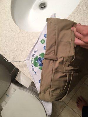 Holes in pants from Them pinning the pants to a hanger