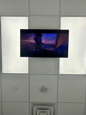 TV on the ceiling above the dentist's chair  Today I chose to watch Moana