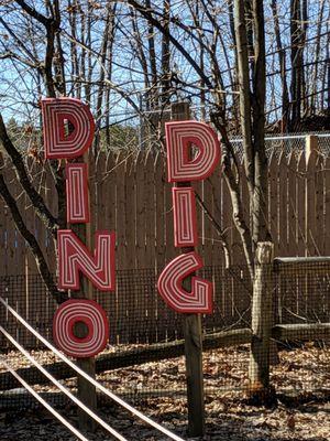 Sign near the triceratops sculpture