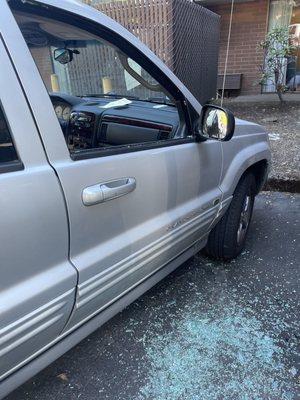 My passenger side window where my wife's backpack was taken out of.