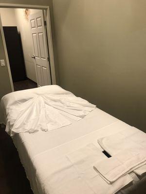 Comfortable massage table in each room