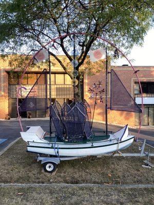 SEVA boat outside the yoga studio.