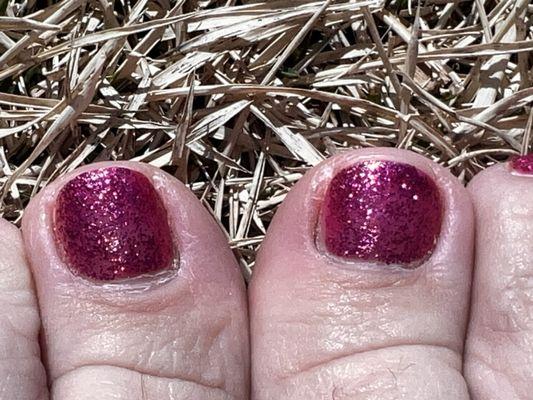 I've been getting glitter polish on my toes for over 5 years, always does two coats of the glitter to make it nice and covered.