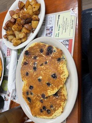 Fresh blueberry pancakes w/ home fries