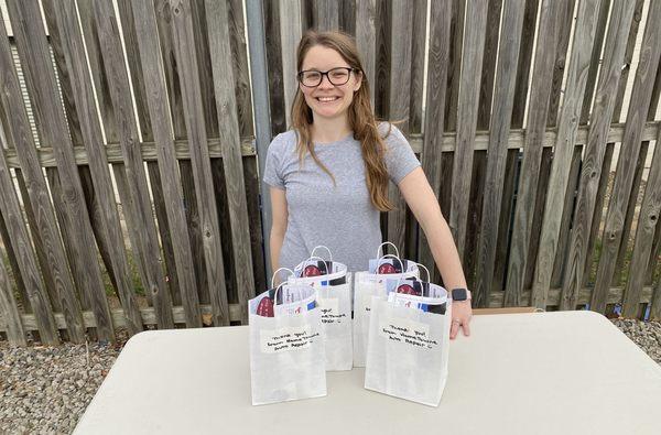 HomeTowne Auto Repair and Tire staff members handed out "Thank You" bags at the Dale City Little League's opening day.