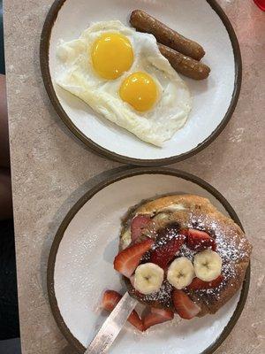 stuffed croissant and eggs and sausage