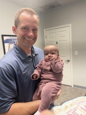 Our sweet little one with dr adam! he's so gentle and the girls love him!