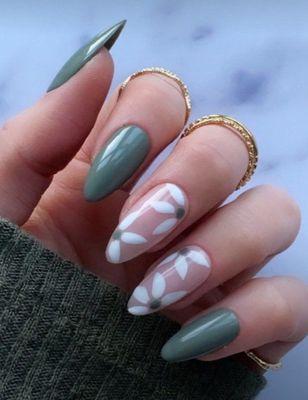 Green nails with white flowers