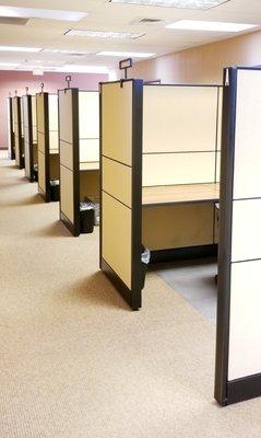 6' X 6' cubicles with lockable storage cabinets and overhead cabinets.