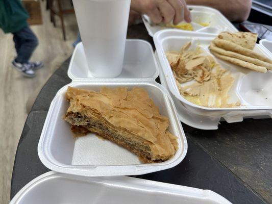 The hummus and giant baklava we were gifted with by the kind staff.