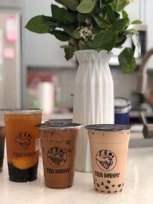 From left to right: Peach green tea with honey boba, Vietnamese coffee, and milk tea with boba