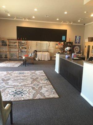 Healing stones, essential oils on display. Seating area