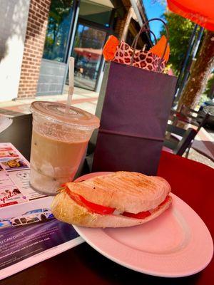 Iced coffee with lavender and caprese panini