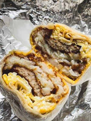 Breakfast burrito. Sausage, egg, cheese, and hash brown in a  wrap. $5.25 + tax + tip