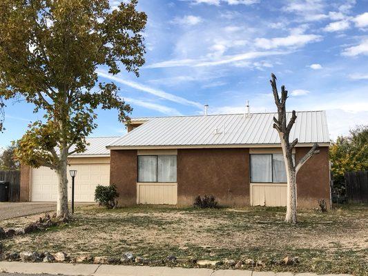 New 26 Gauge Polar White Metal Roof In Rio Rancho by DesignCo Construction.