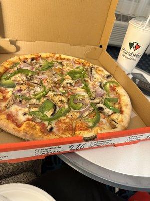 Delicious Roasted Chicken, Onion, Green Pepper, Mushrooms and Cheese Pizza