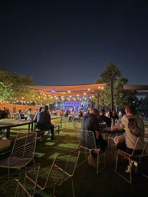 Outside patio at night with live music.