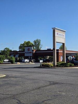 The outside sign of the Freedom First Credit Union Crossroads branch.