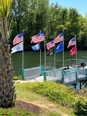 Military service flags on full display near dock slips