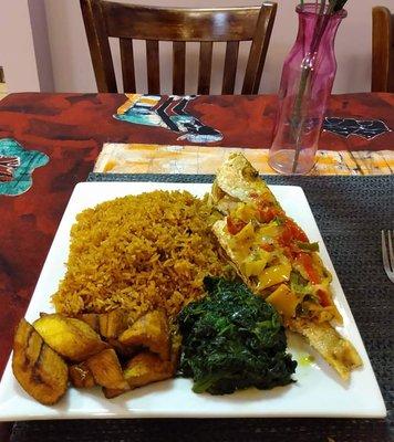 Fried Snapper, Jollof Rice, Fried Plaintains, and Spinach