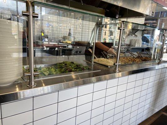 The assembly line of food preparation when you order your food!