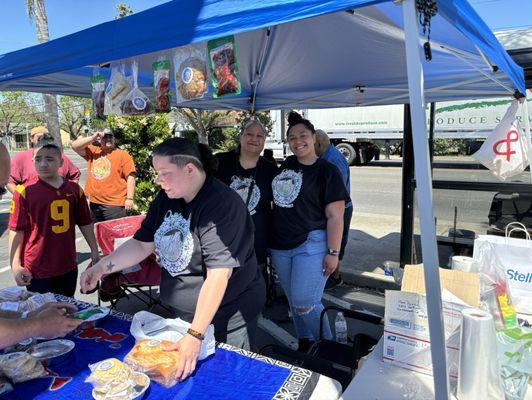 Vendor tent outside Welco Supermarket