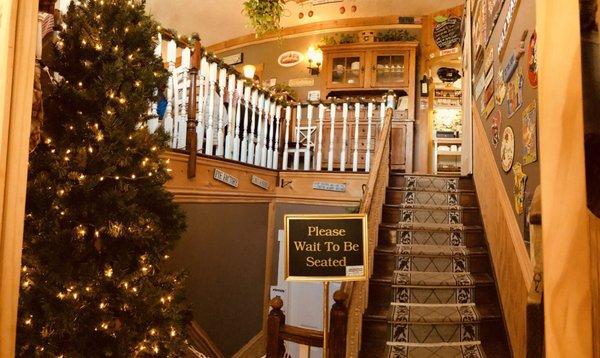 Stairs leading up to the dining room