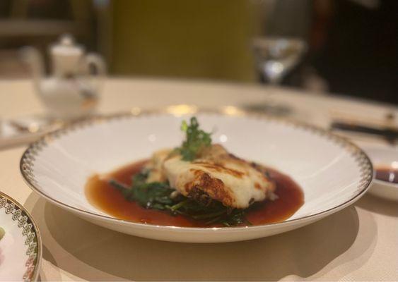 Baked Chilean Sea Bass in bonito soy sauce & spinach