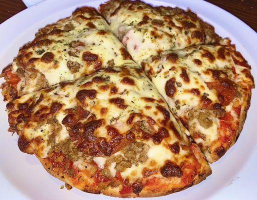 The "Personal-Pizza", topped with Sausage and Pepperoni.