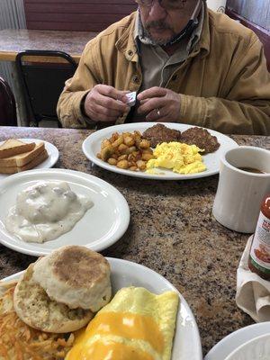 Eggs, sausage and potatoes. Biscuit and gravy.