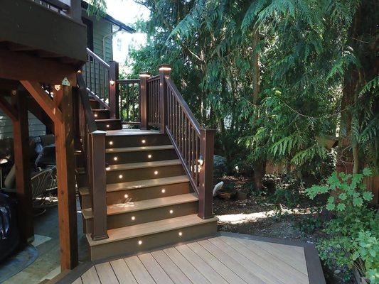 Composite Deck Stairs with railings and deck lighting built by Heilman Deck & Fence