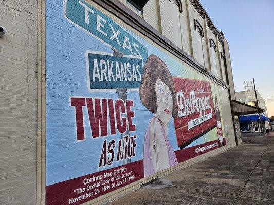 Dr. pepper mural on the side.